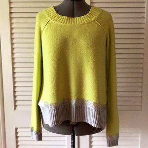 Bright lime green sweater with metallic hem